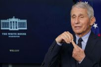 Top infectious disease adviser Anthony Fauci said he was optimistic about Joe Biden's goal of 100 million doses given within his first 100 days