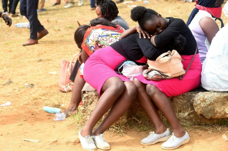 Applicants sleep as they wait to obtain national identity numbers in the Lagos state capital of Ikeja