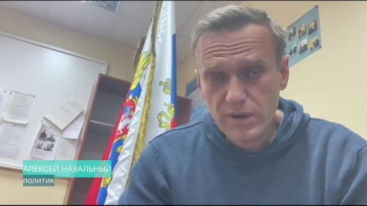 Kremlin critic Alexei Navalny urges Russians to stage mass anti-government protests during a court hearing after his arrest on arrival in Moscow from Germany.