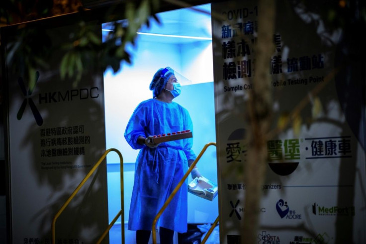 A health worker conducts testing in the Jordan area of Hong Kong