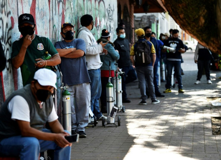 People line up to refill oxygen tanks in Mexico City