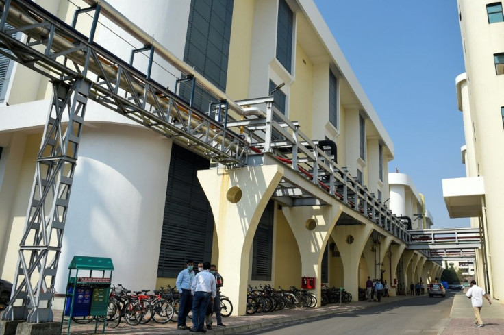 The palm-fringed Serum Institute campus in Pune is home to several buildings where vaccines are manufactured