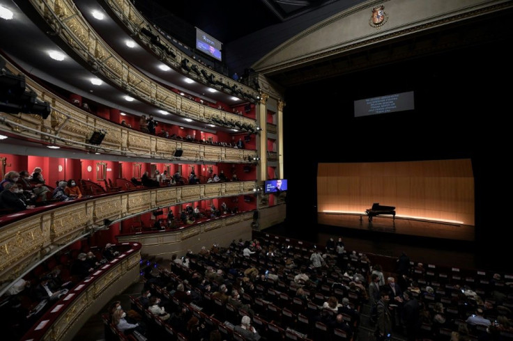 Spectators wait for the start of a performance at the Teatro Real in Madrid on January 14