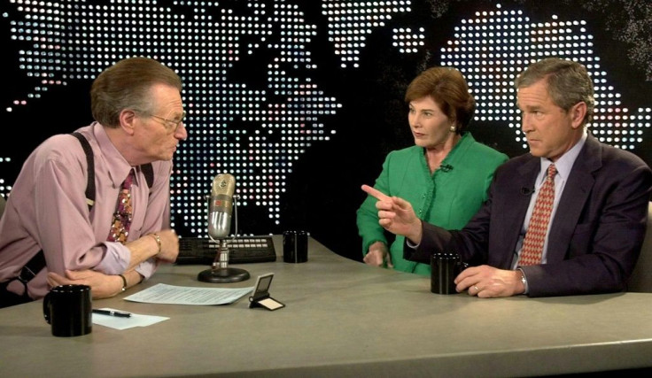 In this file photo taken on September 26, 2000, Republican presidential nominee George W. Bush and his wife Laura appear with talk show host Larry King on Larry King Live in Los Angeles