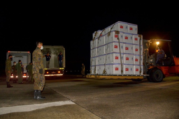 Boxes containing doses of the CoronaVac vaccine arrive in Manaus, Brazil, on January 18, 2021