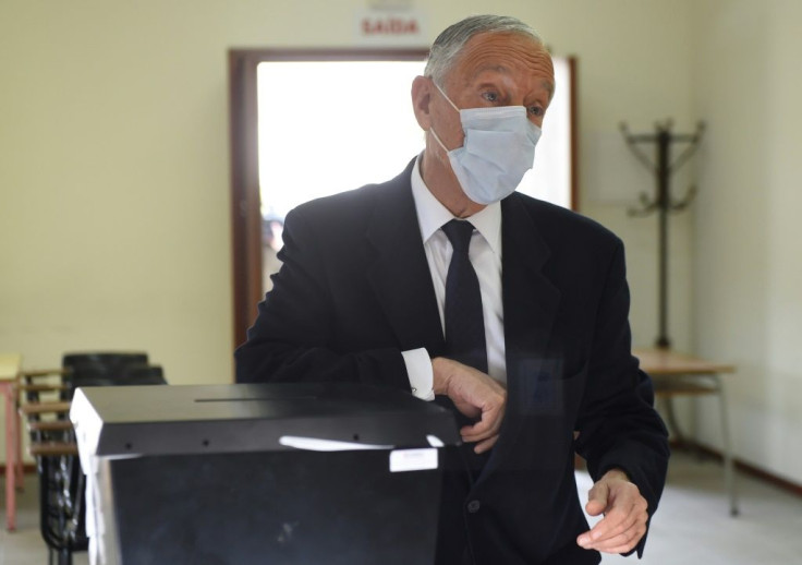 President Marcelo Rebelo de Sousa casting his vote at a polling station in northern Portugal for an election which is expected to hand him a second term