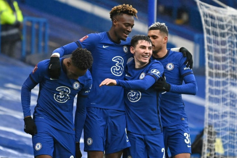 Three and easy: Tammy Abraham (second left) scored a hat-trick in Chelsea's 3-1 win over Luton