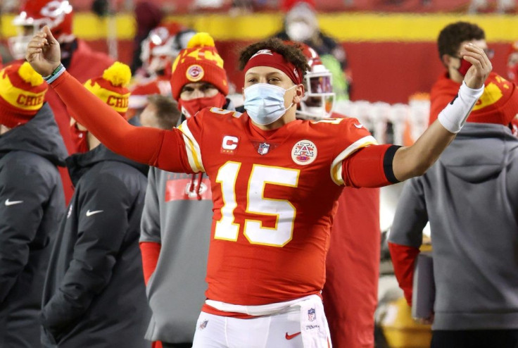 Patrick Mahomes celebrates on the sideline as the Kansas City Chiefs cruise to victory over the Buffalo Bills