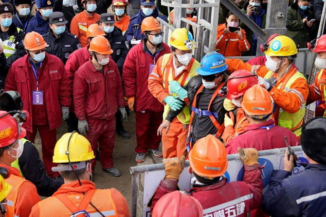 A group of 22 were trapped hundreds of metres underground by the explosion on January 10, with some relying on food and medicine delivered through long shafts