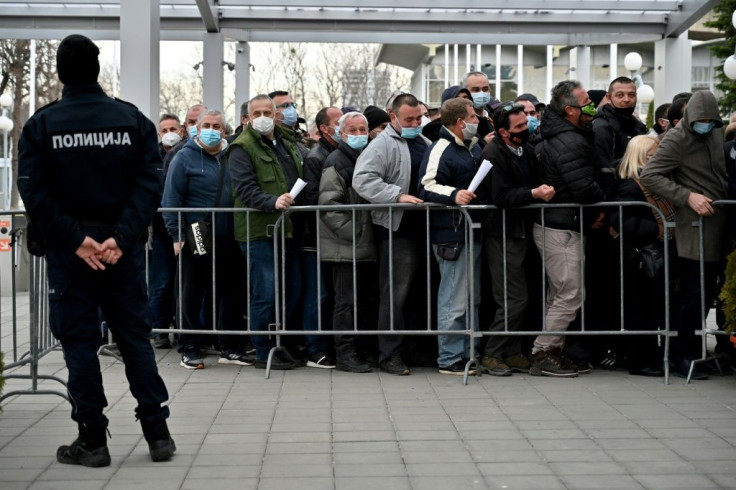People queue to receive the Chinese-made Sinopharm Covid-19 vaccine in Belgrade