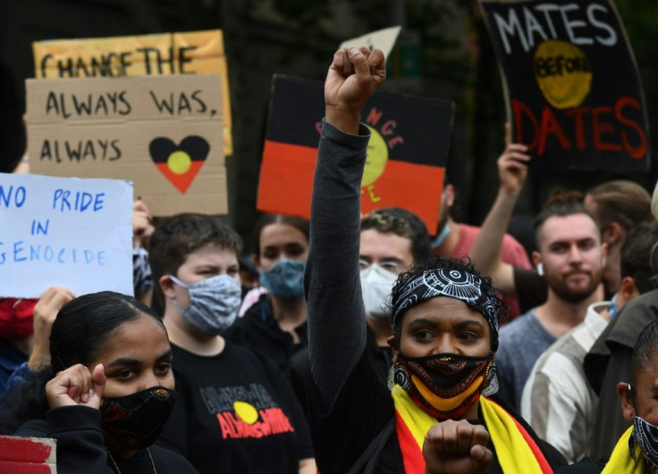 Thousands defied coronavirus rules to rally in cities across Australia on Tuesday to protest the country's national day