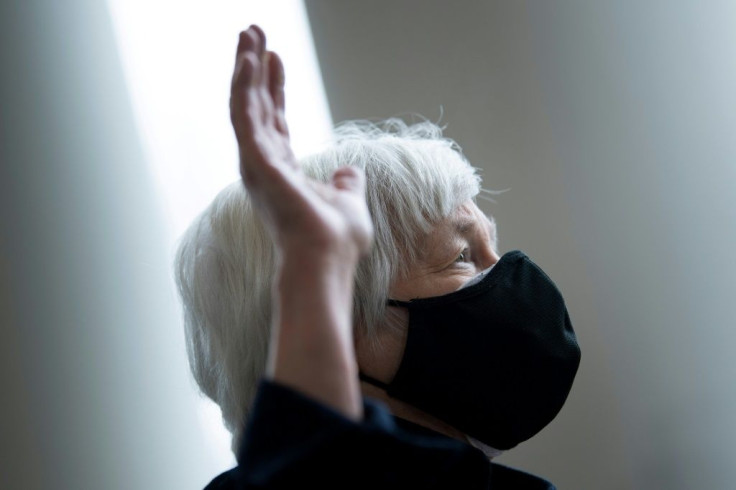 Janet Yellen raises her right hand as she is sworn in as US Treasury Secretary by Vice President Kamala Harris at the White House, a historic event as each is the first woman to serve in their respective roles