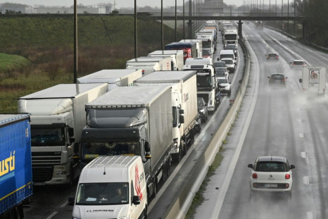 Hundreds of trucks bound for Britain wait to cross from Calais just before Christmas