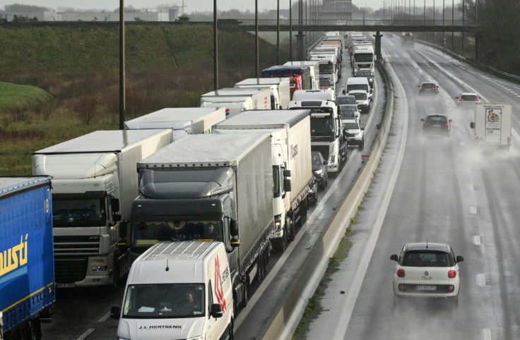 Hundreds of trucks bound for Britain wait to cross from Calais just before Christmas