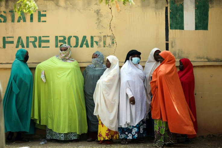 Parents of abducted schoolboys waited outside a camp last month to receive their children upon their release