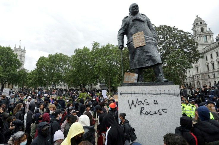 The statue of former British prime minister Winston Churchill is seen defaced during a Black Lives Matter demonstration in London last June