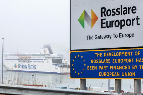 On the sloping approach to the docks, a sign welcomes the steady stream of traffic to "Rosslare Europort: the gateway to Europe"