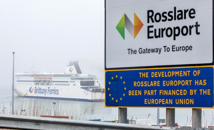 On the sloping approach to the docks, a sign welcomes the steady stream of traffic to "Rosslare Europort: the gateway to Europe"