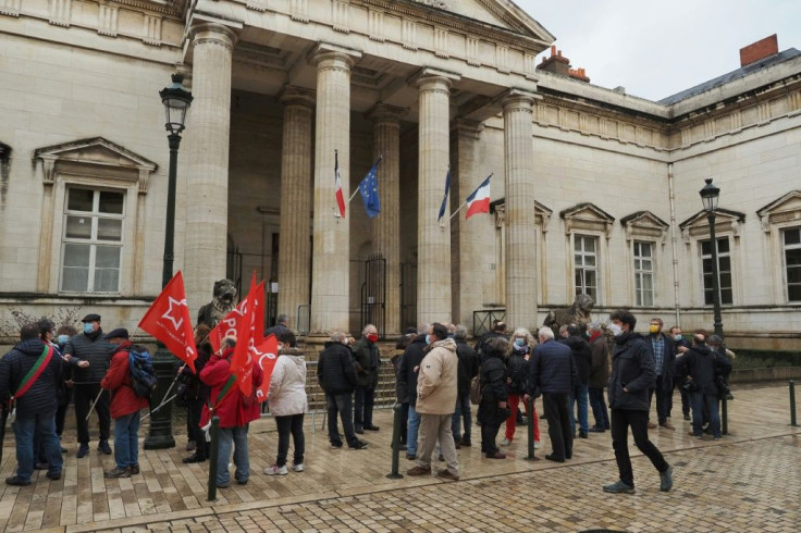Duralex employees gathered outside the Orleans courthouse ahead of the ruling