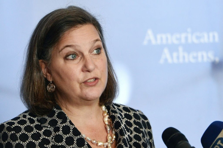 Victoria Nuland, seen on a 2016 visit to Greece, has been named as number three at the State Department and is known for her hard line on Russia