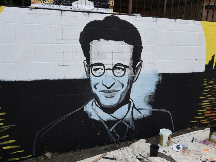 A partially completed portrait by artist Levi Ponce for his Memorial Day mural project of murdered journalist Daniel Pearl, near his old neigborhood in Los Angeles, California in  2015