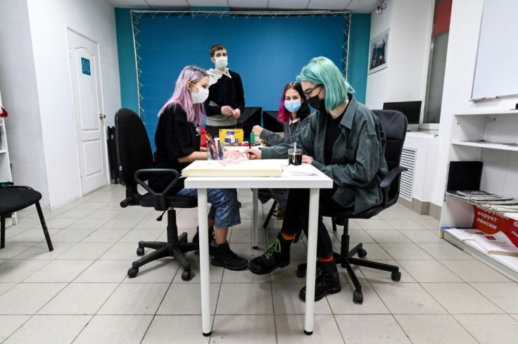 Activists prepare placards for an upcoming protest rally. Many in the Urals city of Perm, 1,200 kilometres (750 miles) east of Moscow,Â are angry, pointing to a city in decline