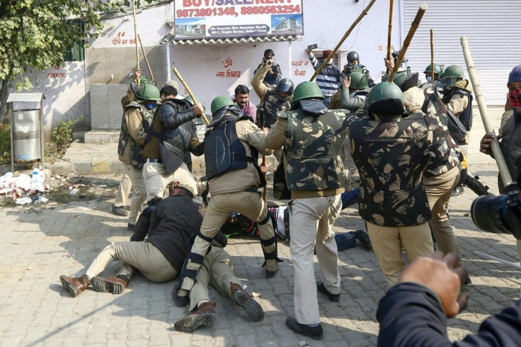 Supporters and opponents of Indian farmers protesting rural reforms clashed, with police charging both groups to keep them apart