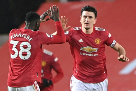 Manchester United captain Harry Maguire (right) offered his support to team-mates Axel Tuanzebe and Anthony Martial after they were subjected to racist abuse on social media