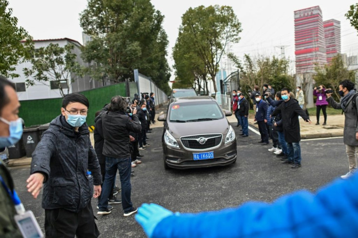 WHO experts are visiting Wuhan, China, to seek clues about the origins of the coronavirus pandemic, under intense media scrutiny