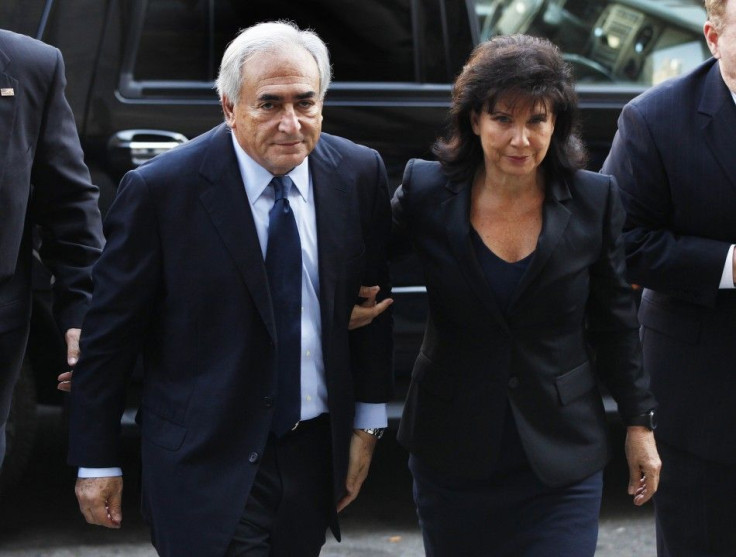 Former IMF chief Strauss-Kahn arrives with his wife Anne Sinclair at Manhattan Criminal Court for his arraignment in New York