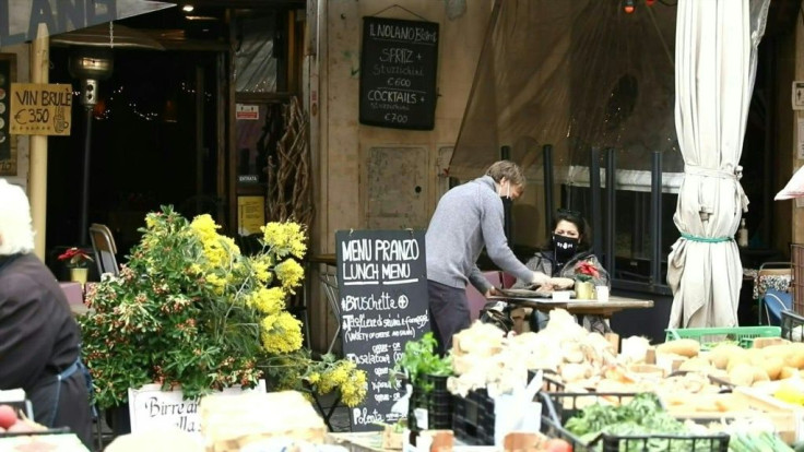 IMAGESRestaurants on Campo de' Fiori square in Rome reopen, as an easing of coronavirus restrictions means they are permitted to serve customers during the day. Sixteen regions are now under the lower-risk "yellow" category, while five -- Sicily, Sardinia