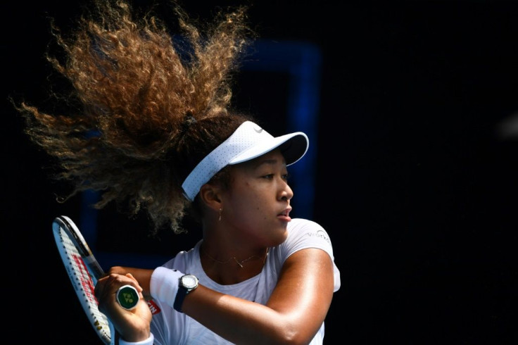 Japan's Naomi Osaka hits a return against France's Alize Cornet on her way to a straight-sets win