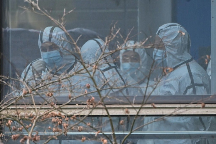 World Health Organization experts visited an animal disease control centre in Wuhan