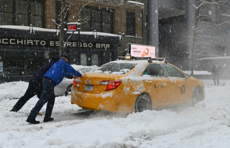 A winter storm pushed oil prices higher as the market anticipated a draw on stocks for heating