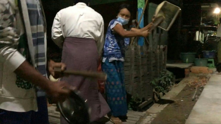 Yangon residents protest against the coup by banging pots and pans