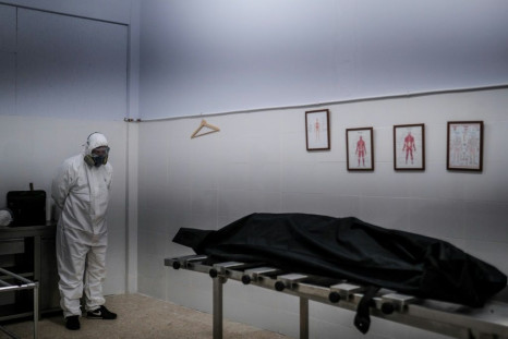 At a funeral parlour in the outskirts of Lisbon, staff are straining to cope with all the bodies piling up due to Covid