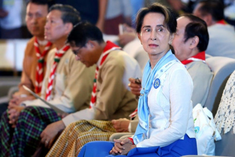 Aung San Suu Kyi has been charged with breaching an import and export law, according to her party