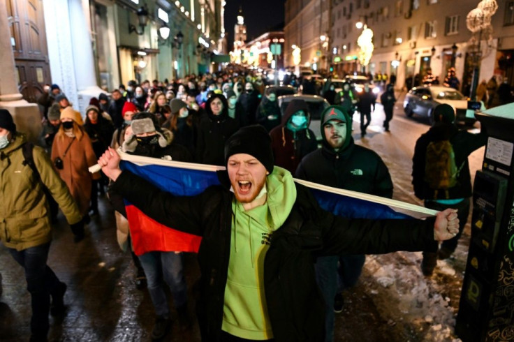 People in downtown Moscow protest against a prison term handed down against  opposition leader Alexei Navalny