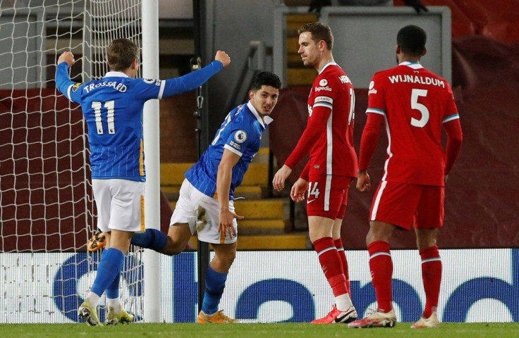 Brighton's Steven Alzate (2L) celebrates scoring at Liverpool