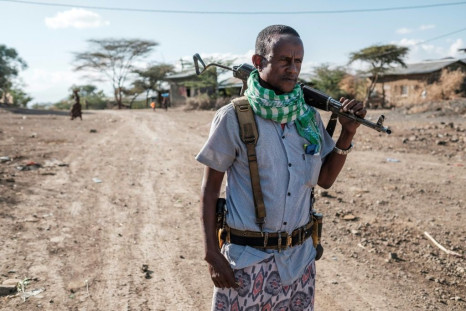 A militiaman in Ethiopia's Tigray region in December 2020. Not enough aid is being allowed in, the UN has warned