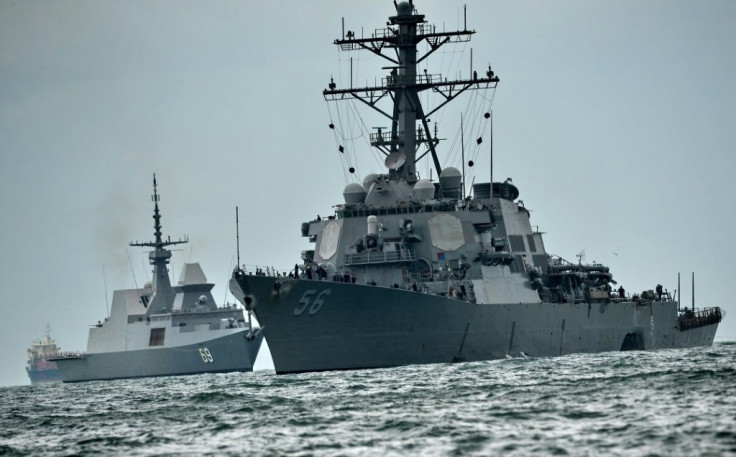 The USS John S. McCain (R), pictured here in 2017, sailed through the Taiwan Strait on Thursday
