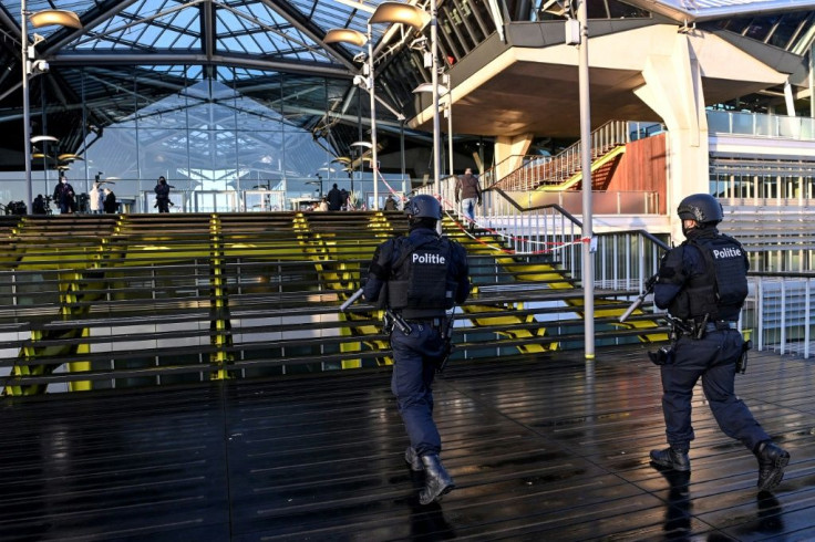 Heavily armed policemen patroled outside the courthouse during the trial