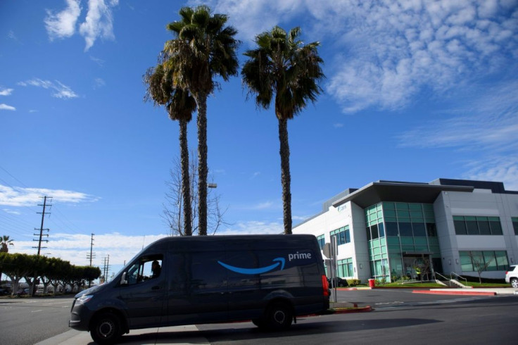 An Amazon. delivery driver departs a distribution facility in Hawthorne, California. The e-commerce giant said it was installing cameras which use artificial intelligence to monitor driver safety