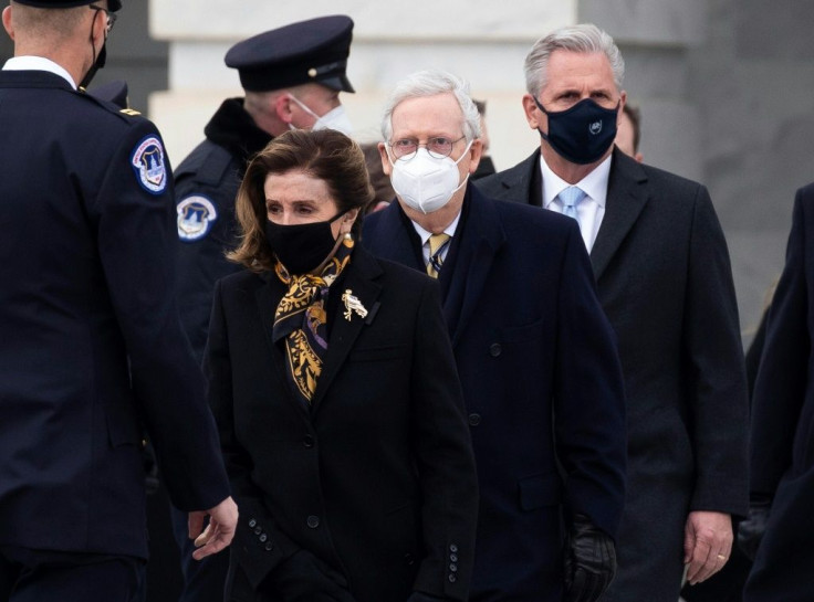 US House Minority Leader Kevin McCarthy, at right, is struggling to unify a Republican Party splintered between loyalists to former president Donald Trump, and traditional conservatives and moderates uncomfortable with extremist rhetoric