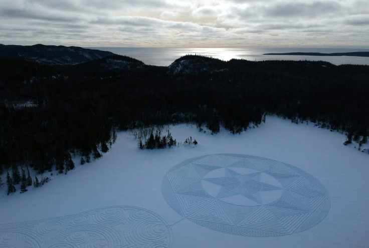 Kim Asmussen says of his snow art "once you've made a mark in the snow you can't erase it. It's not like drawing on a piece of paper"