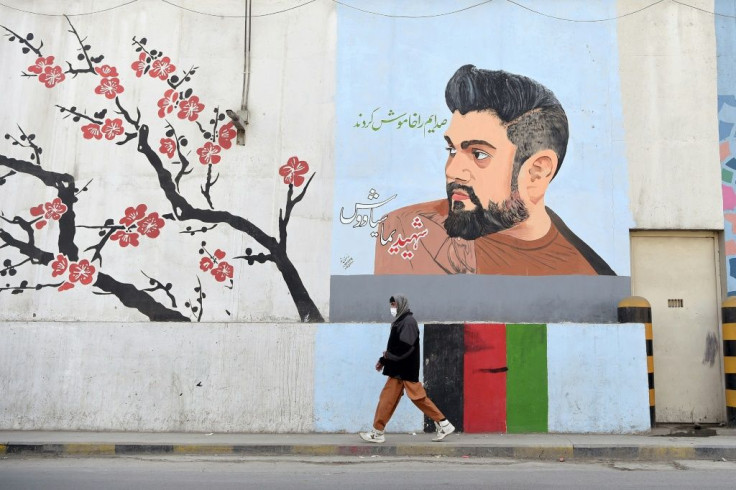 A roadside mural in Kabul pays homage to former Afghan Tolo TV presenter Yama Siawash, who was killed in a bomb attack on November 7, 2020