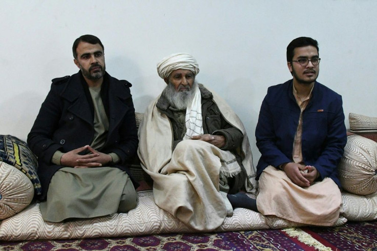 Mohammad Taher Rasheed (C), is the father of assassinated activist Mohammad Yousuf Rasheed, one of several Afghans to have been targeted in string of recent political attacks