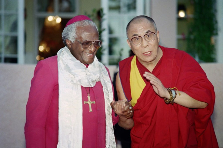 Nobel Peace Prize winner Archbishop Desmond Tutu, left, with the Dalai Lama, a fellow laureate, has said he will take the coronavirus vaccine
