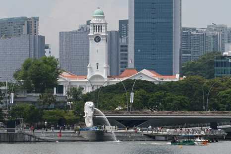 Nine Britons were charged in Singapore Friday over a yacht party that breached coronavirus restrictions