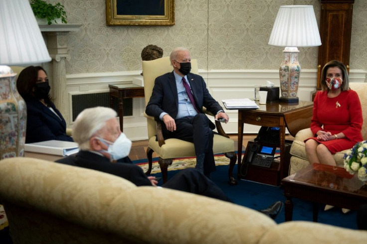 US President Joe Biden and US Vice President Kamala Harris meet with House Majority Leader Steny Hoyer (D-MD), Speaker of the House Nancy Pelosi (D-CA), and others during a meeting about the economy and COVID relief in the Oval Office of the White House F